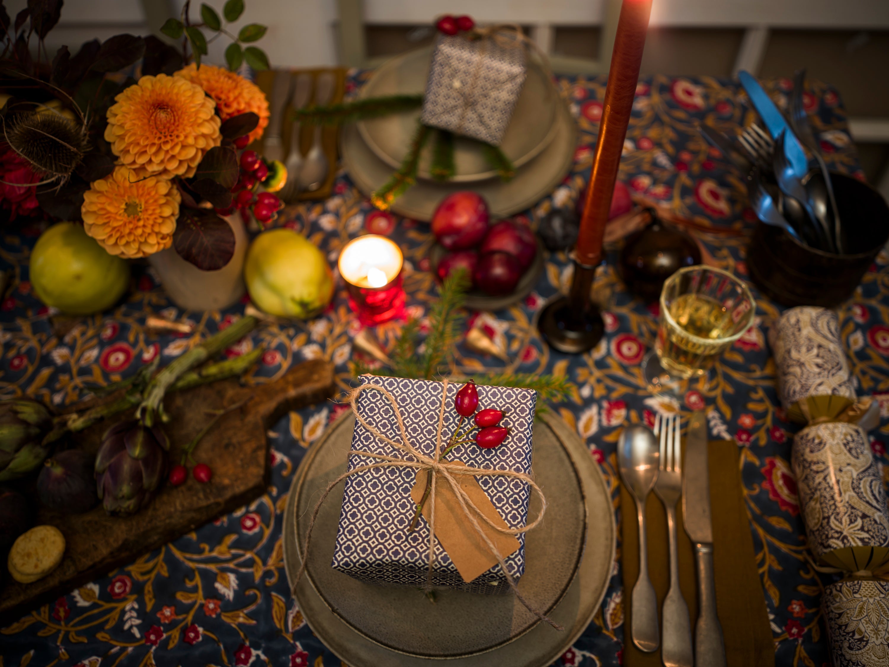 a festive holiday table set for christmas eve dinner