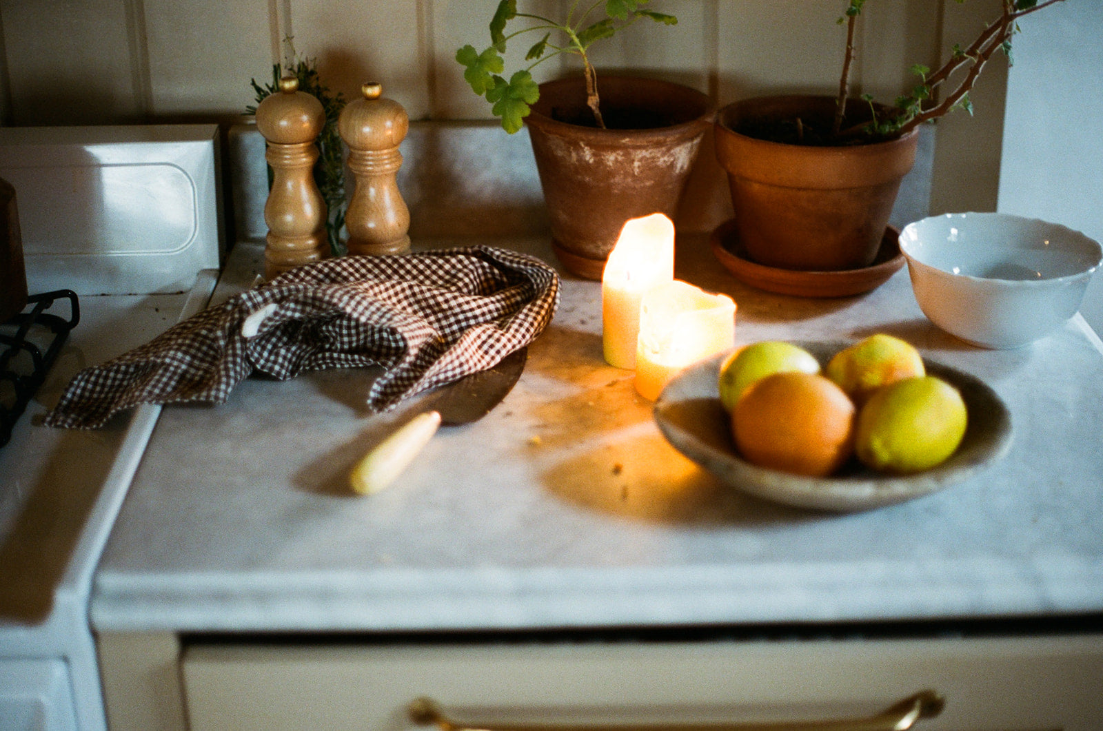 citrus fruits laid out on a marble countertop, ready to be used in this delicious seasonal cake recipe